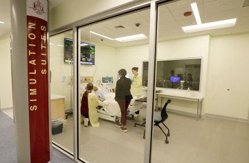 Students work on nursing skills in CU's simulated learning lab