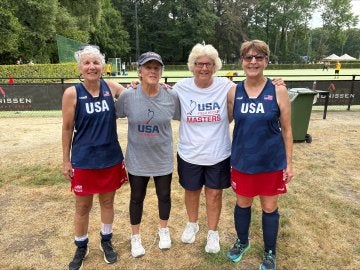 From left, are Jeanette (Newcomer) Arnold '83, Pam "Brillo" Sherry '78, Denise "Gobie" Gobrecht '79, and Pat Rudy '77 at the 2026 World Masters Hockey World Cup.