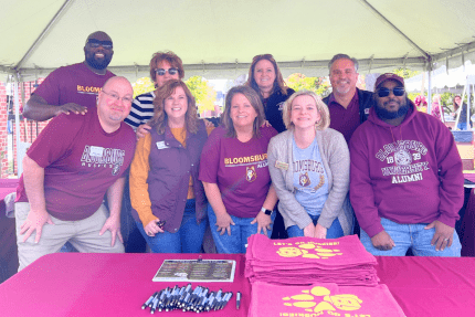 Bloomsburg Alumni Association board members take a group photo at Homecoming