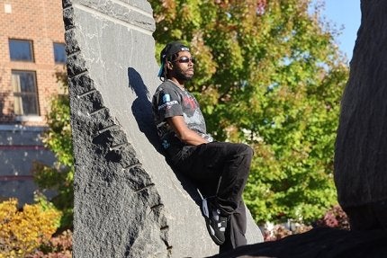 The sophomore digital forensics major and black studies minor, who’s also heavily involved in multimedia entertainment, is among the small cast featured in the 30-second Major League Baseball apparel commercial that ran throughout the postseason, peaking during the record-setting World Series.