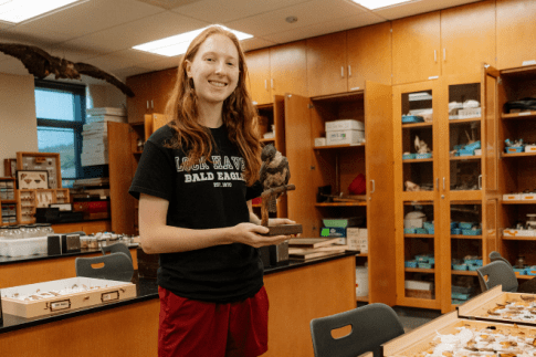 MS Biology student standing in science lab
