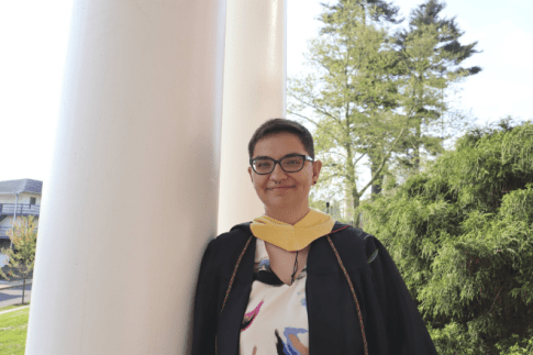 MSW student standing in front of Carver Hall