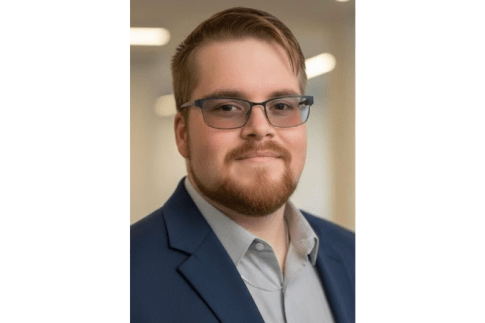 MSW student standing in an office