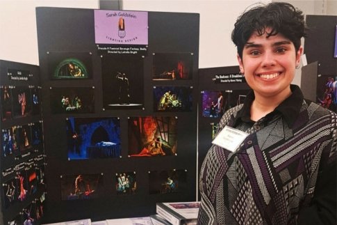 Sarah Goldstein, '22 Theatre Arts, poses in front of her lighting design presentation