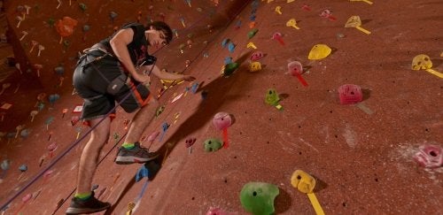 Student climbs on rock wall at Commonwealth University-Mansfield, formerly Mansfield University, Kelchner Fitness Center