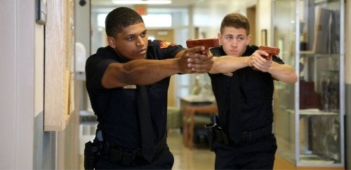 Cadets presenting firearms during training exercise at the Mansfield Police Academy.