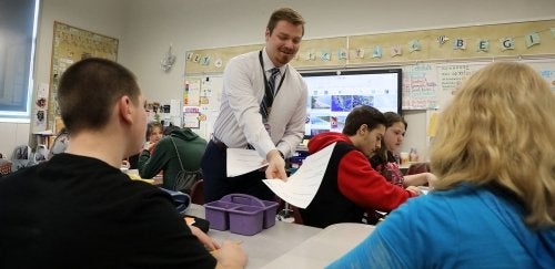 Student teacher, Zach H, assisting in classroom.