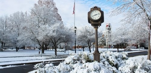 Lock Haven campus clock during fresh snowfall.