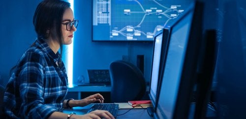 Woman using a desktop computer