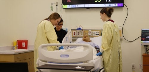 Students work on nursing skills in CU's simulated learning lab