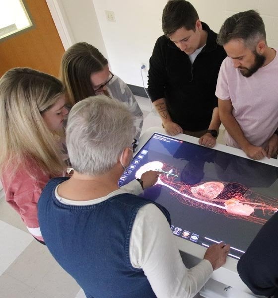 Professor using technology table