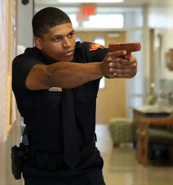Cadet presenting firearm during training exercise at the Mansfield Police Academy.