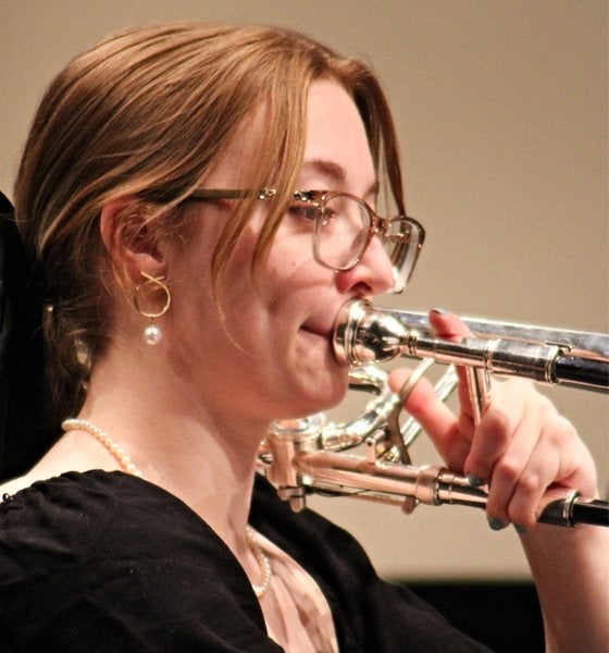 Student playing instrument in the Lock Haven Jazz Band Club