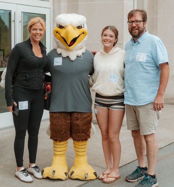 Incoming Lock Haven student, Kallie Kleckner, poses with her parents and Talon during 2026 New Student Orientation