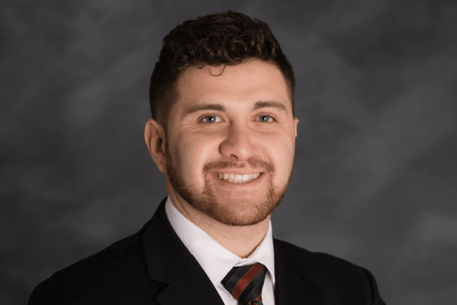 A headshot of a man. 