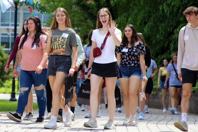 students walk across Lock Haven's campus