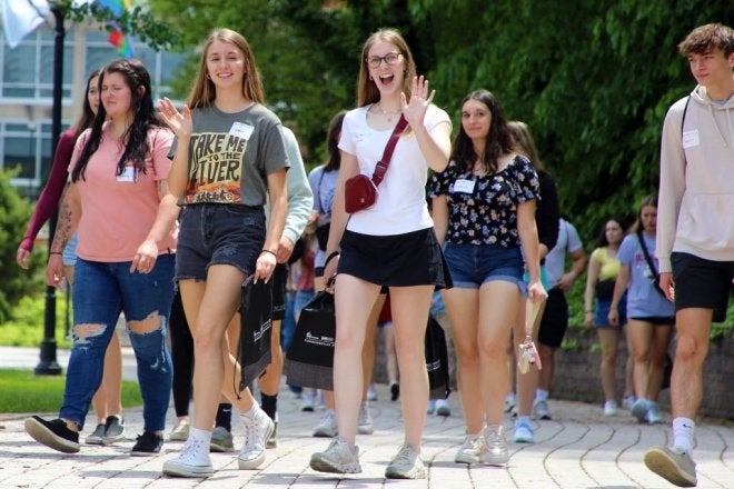 students walk across Lock Haven's campus