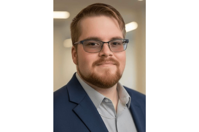 MSW student standing in an office