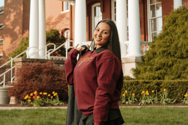 Medical Imaging student in front of Carver Hall on the Bloomsburg campus