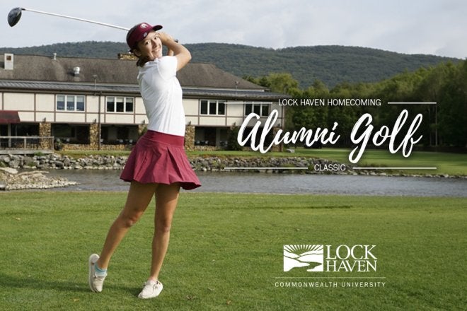 Female golfer swinging club