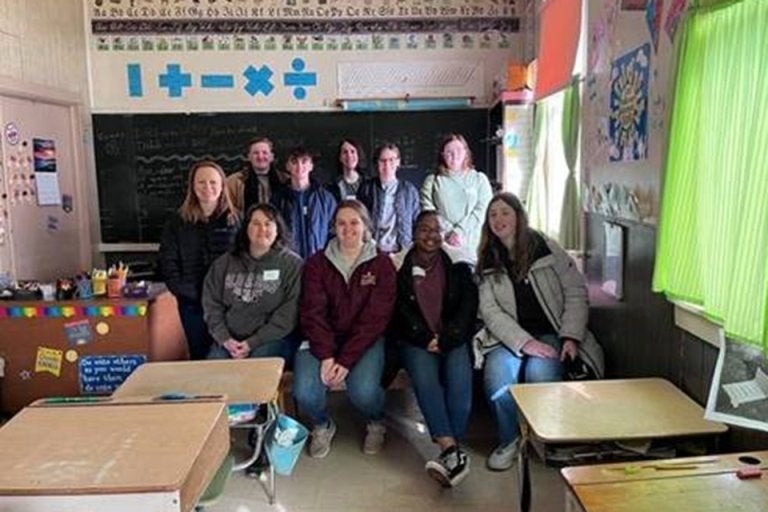 A group of people sitting together. 