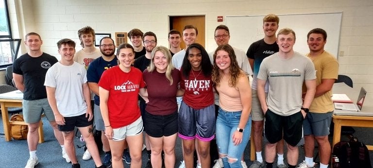 A group of students standing together for a photo. 