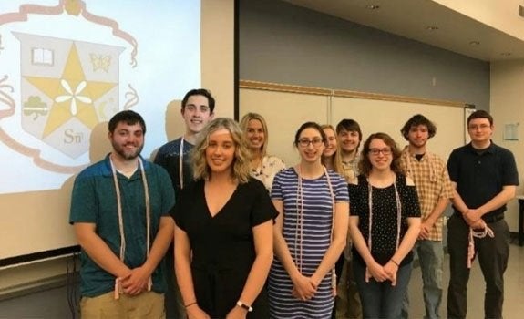 Kappa Mu Epsilon students pose for a photo.